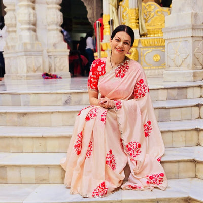 Prachee Pandya in a Light Peach red block crepe saree with floral blouse and mirror Scallope Border