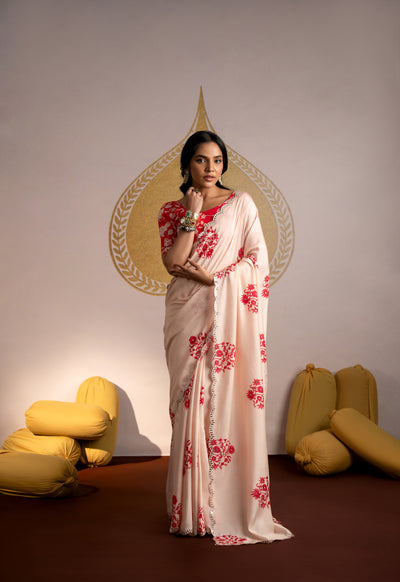 Prachee Pandya in a Light Peach red block crepe saree with floral blouse and mirror Scallope Border