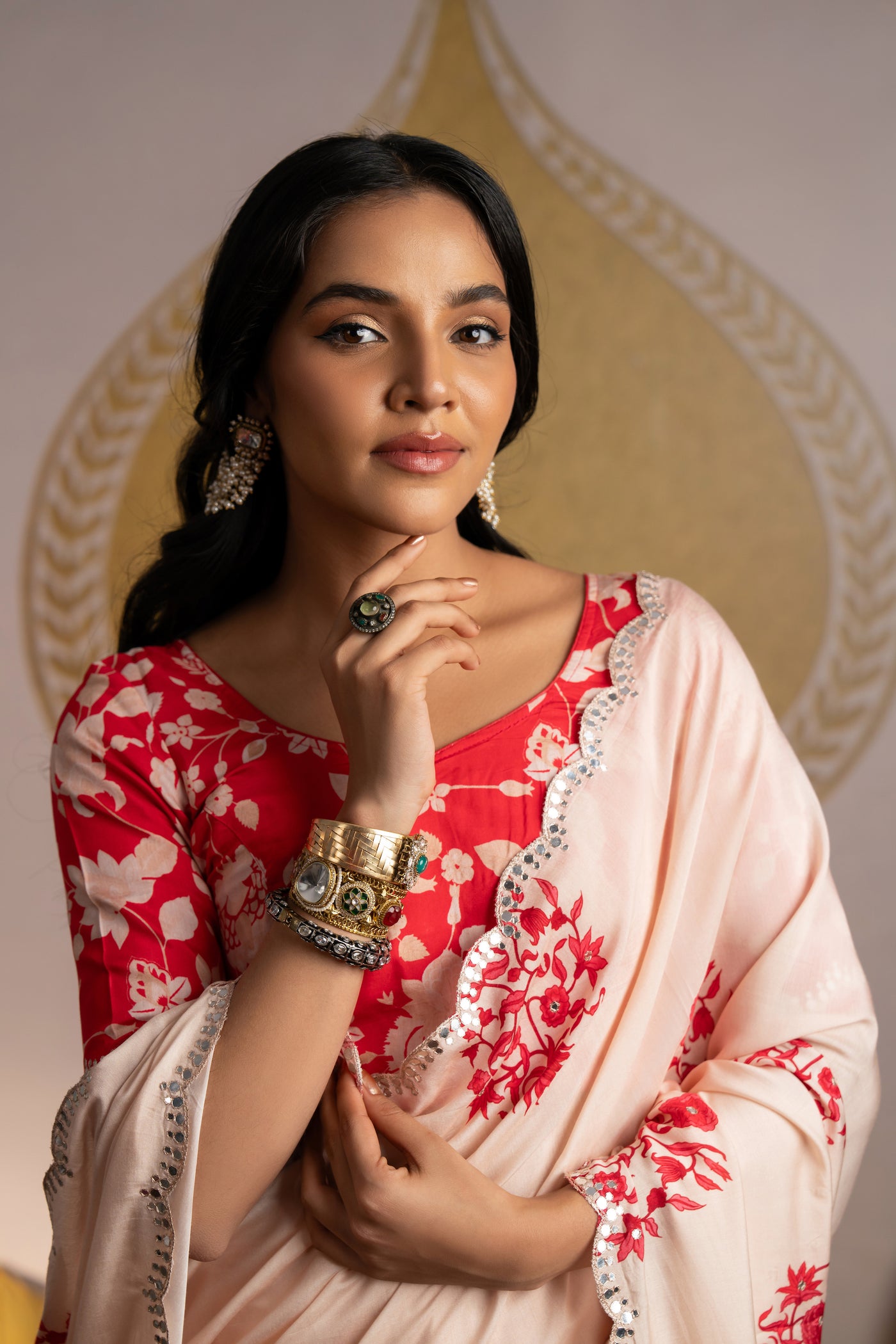 Prachee Pandya in a Light Peach red block crepe saree with floral blouse and mirror Scallope Border