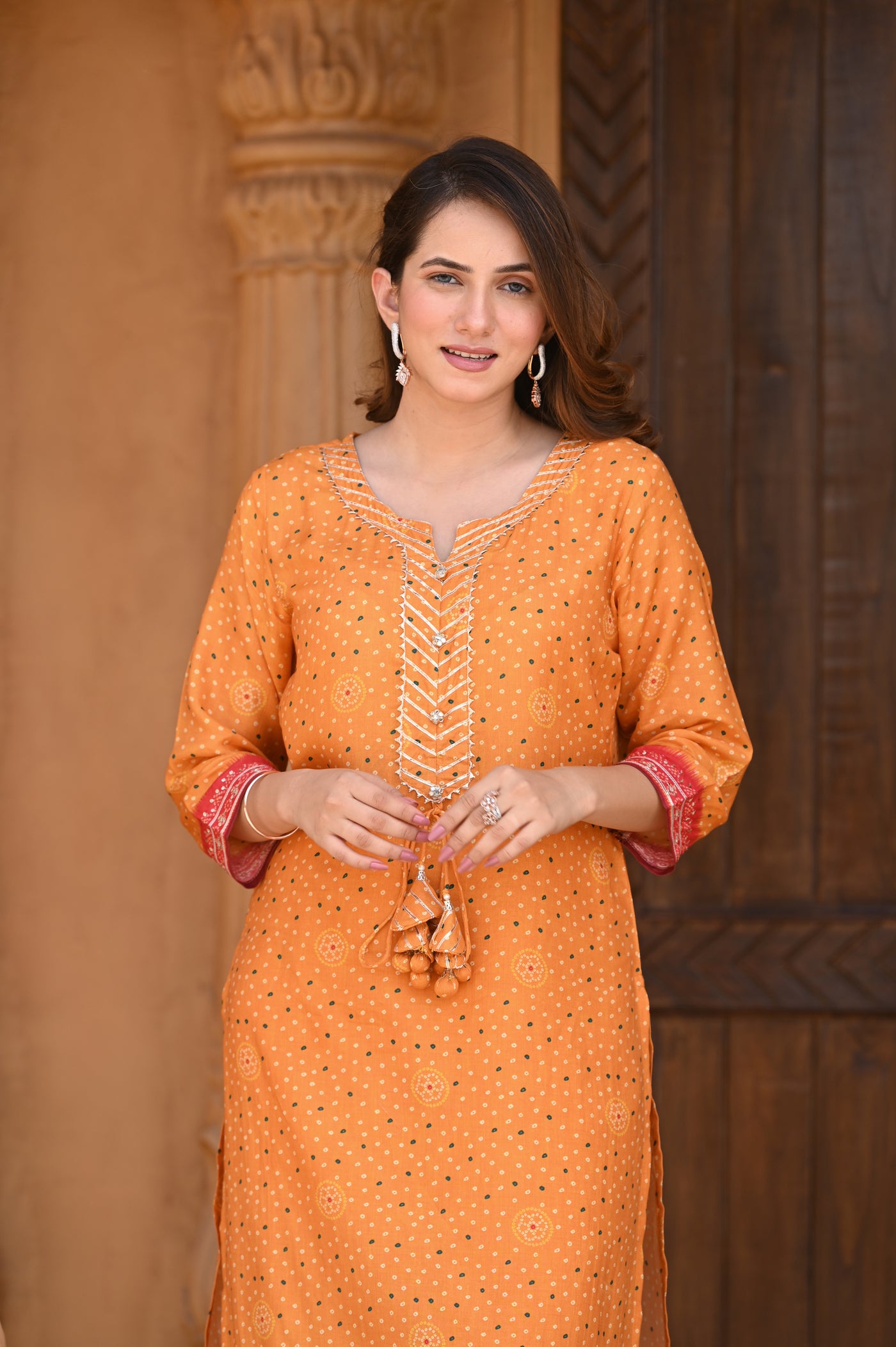 Yellow Jharoka Ombre Muslin Kurta Set with Gota Work & Tassels